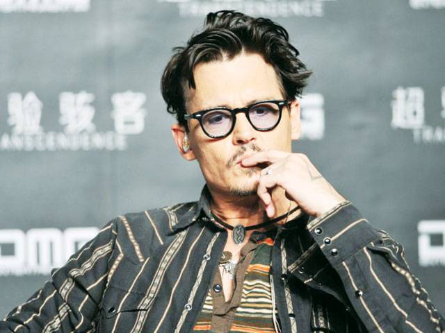 Johnny Depp settles with former managers