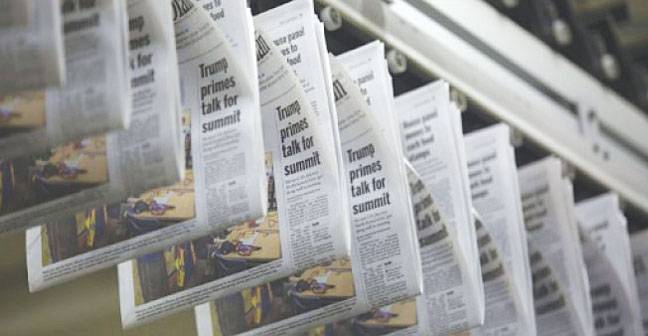 Ailing US newspapers feel new pain from newsprint tariffs