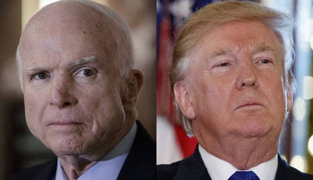 Trump isolated in his silence on McCain
