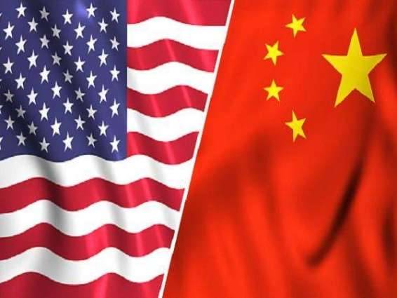 China warns of protectionism as US trade row simmers