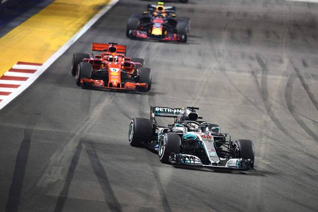 Hamilton wins Singapore Grand Prix to increase title lead
