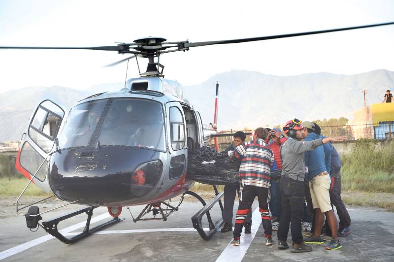 Nepal rescuers retrieve bodies of nine climbers