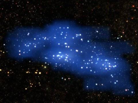 Remotest titanic cosmic structure in early Universe found