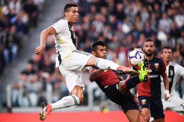 Ronaldo celebrates landmark goal but Juve's perfect run broken