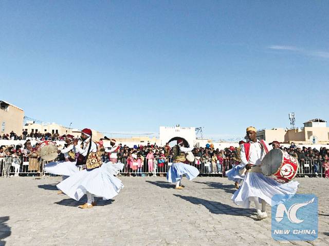 Tunisian small town attracts flocks of tourists with exotic desert festival
