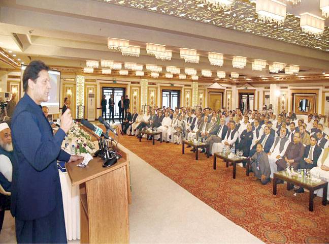 PM seeks traders’ role in tax collection