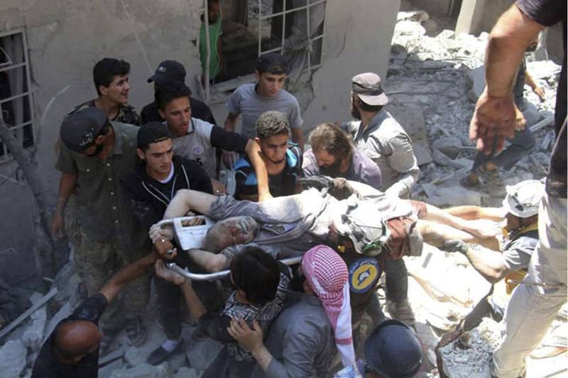 Syrian rebel town pounded, 11 killed in market airstrike