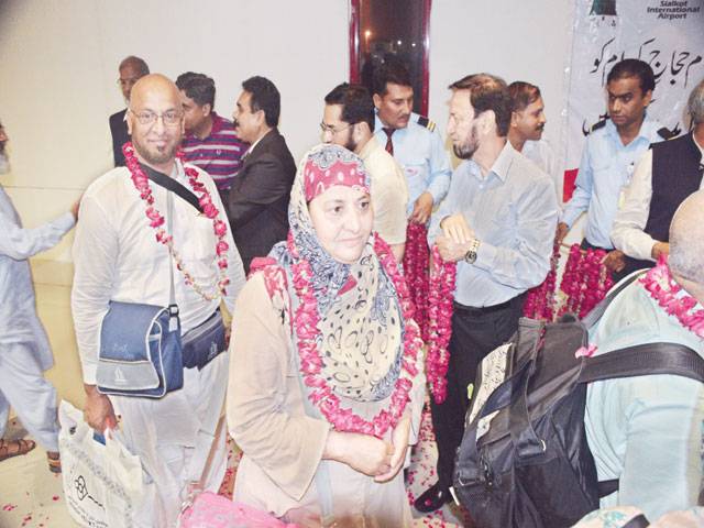 PIA first Hajj flight lands at SIAL