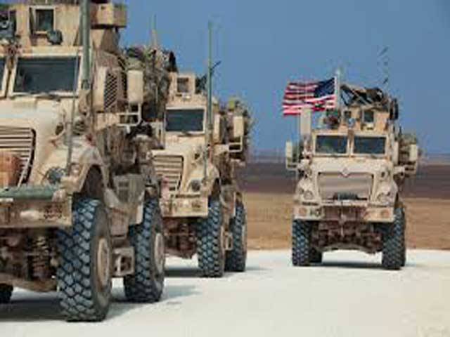 Residents of northeast Syria city pelt departing US troops