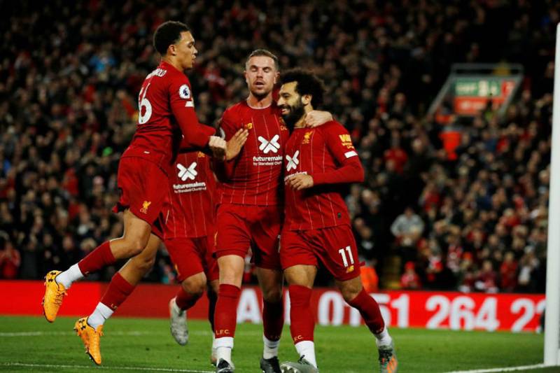 Liverpool march on, United win 
