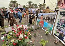 Baghdad mob kills teen gunman and strings up his corpse
