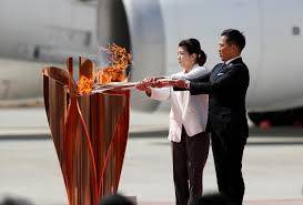 Crowds form at Olympic torch event in Japan despite coronavirus caution