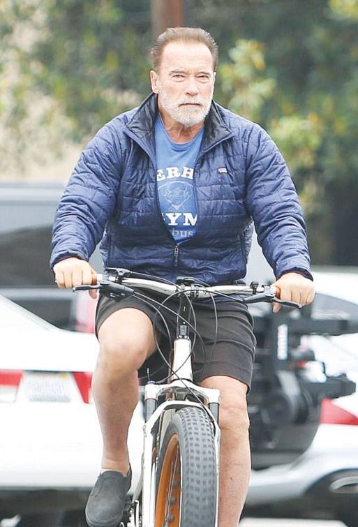 Arnold leads the way during a bike ride