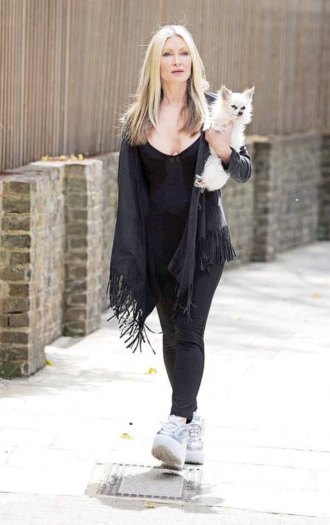 Model Caprice takes her ‘miracle’ dog Stinker for a walk