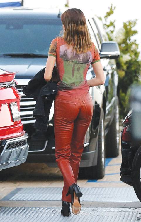 Kendall Jenner flaunts her model figure in red leather pants