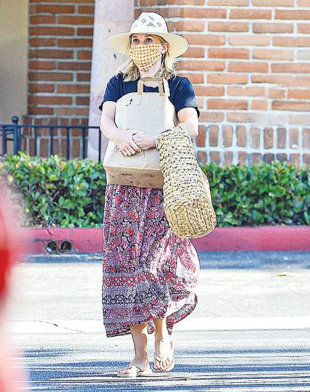 Reese Witherspoon cuts a boho chic look as she spotted carrying groceries