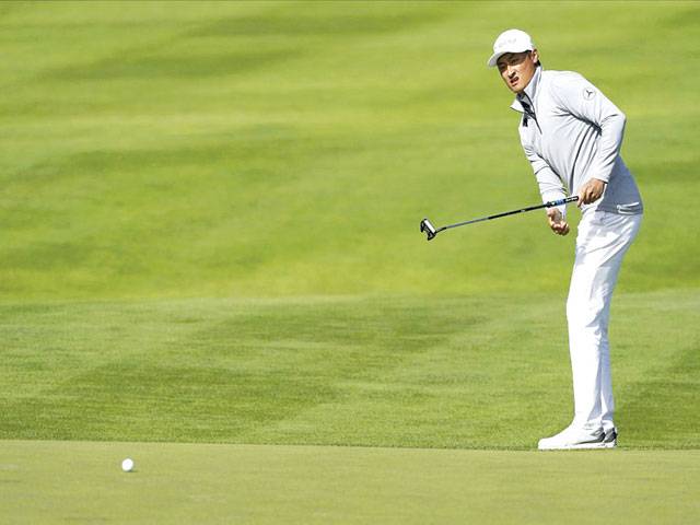 In milestone for China, Haotong leads halfway through PGA