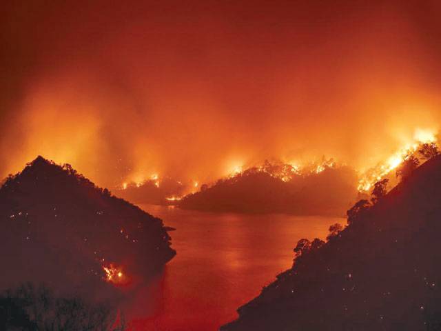 California fires force thousands to flee as more blazes feared