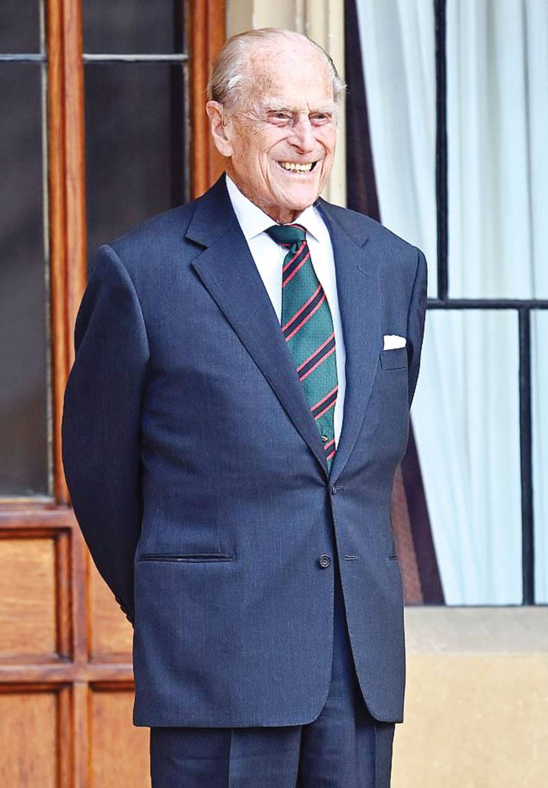 Prince Philip joins the Queen after two-week stay