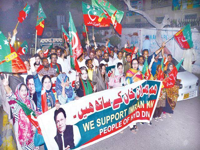PTI workers take out rally to express support for PM