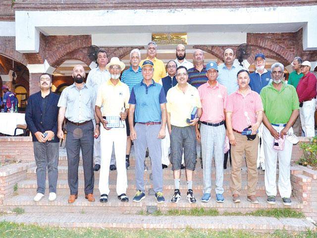 Golfing out of Ex-Wapda Chairman Muzzamil Hussain held at Gymkhana