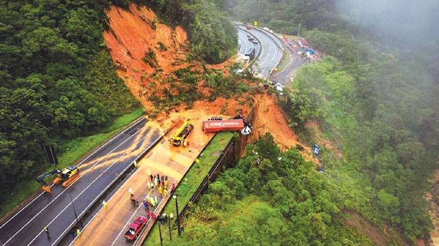 Two dead, dozens missing as landslide wipes out Brazil highway