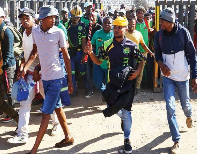 Hundreds held underground in South Africa gold mine protest