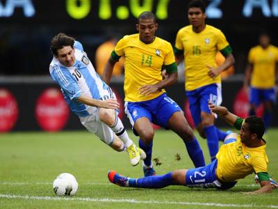 Messi's hat-trick lifts Argentina over Brazil