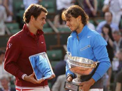 Nadal overpowers Federer to reach year-ending final