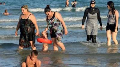 French city Nice suspends burkini ban after defiance