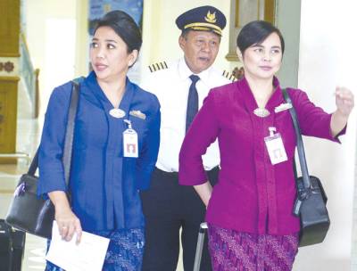 Aceh orders female flight crews to wear hijab