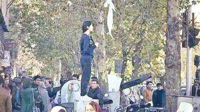 Iran headscarf protester arrested
