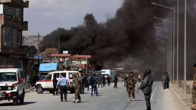 Suicide blasts kill dozens in Afghanistan