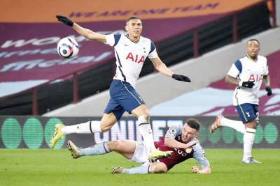 Tottenham end dismal week with Villa win
