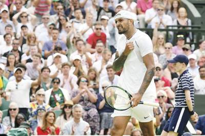 Quieter Kyrgios overcomes shoulder, US foe at Wimbledon