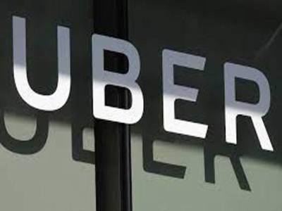 Uber reports loss, but beats income expectations
