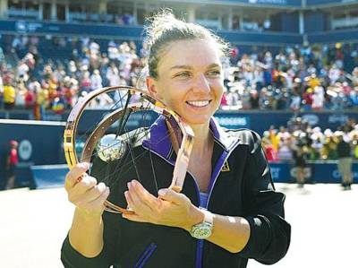 Halep lifts a third Canadian Open title