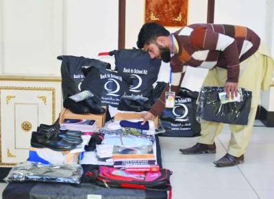 NGO distributes stationery, uniforms among 100 orphans